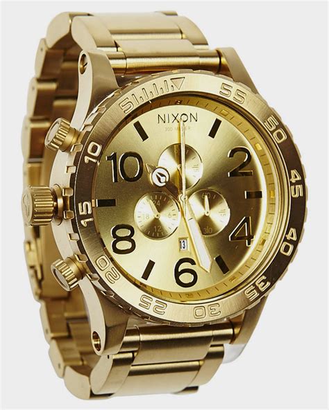 nixon all gold